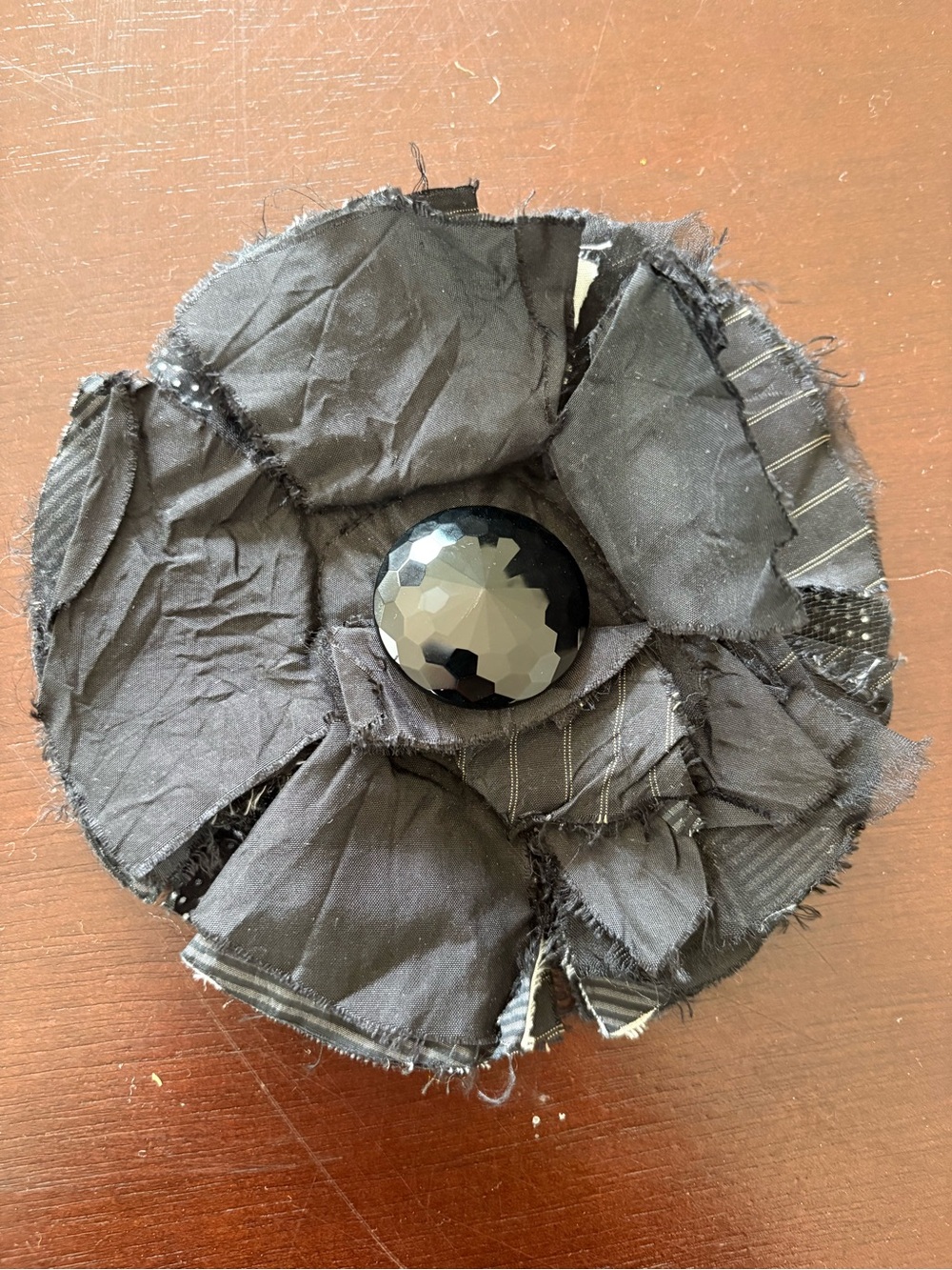 Elegant Black Fabric Flower Brooch with Faceted Center